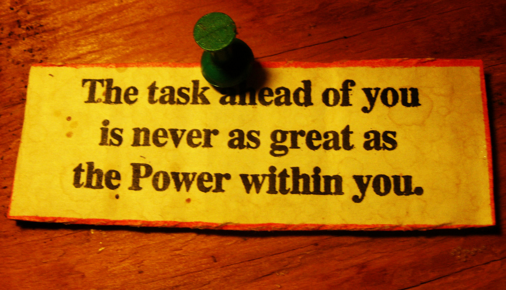 Picture of thumbtack and a piece of paper with the text The task ahead of you is never as great as the Power within you. The picture is called An inspirational message over the sink by Bunny Jager available at https://flic.kr/p/88f39H under CC-BY-SA.